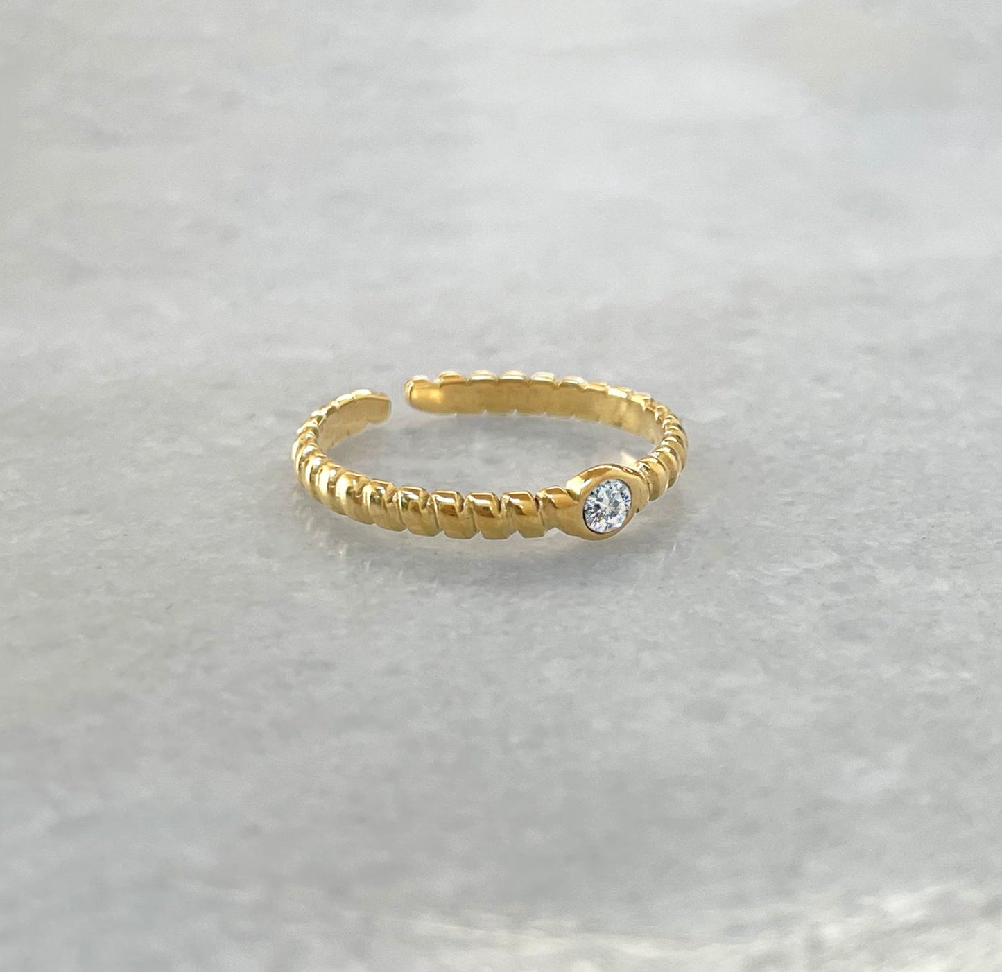 HELINA ADJUSTABLE DAINTY GOLD SOLITAIRE STACKABLE RING